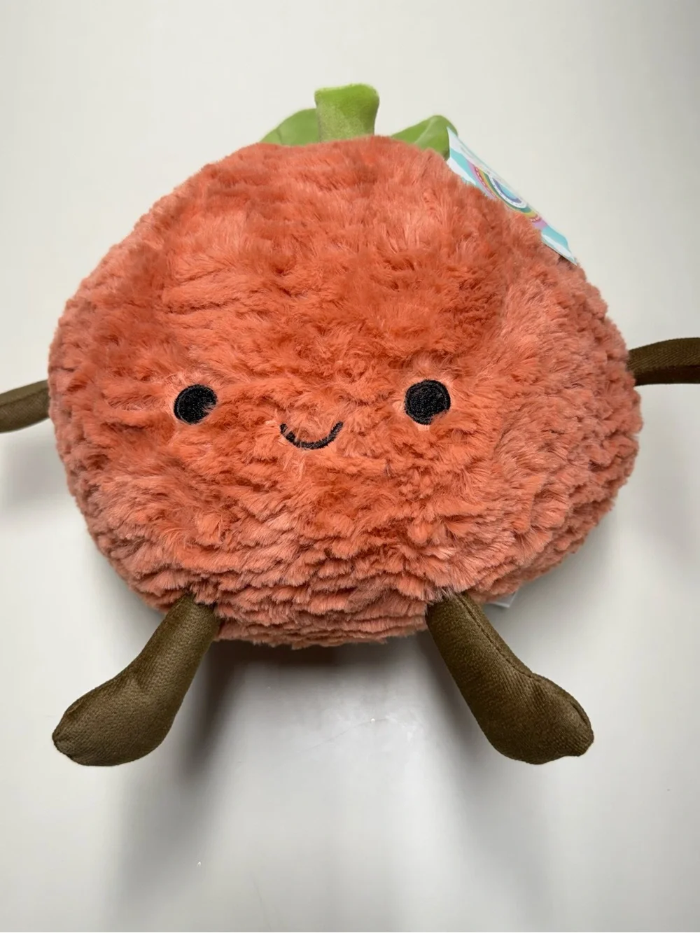 Plush Orange Fruit Character with Green Leaves